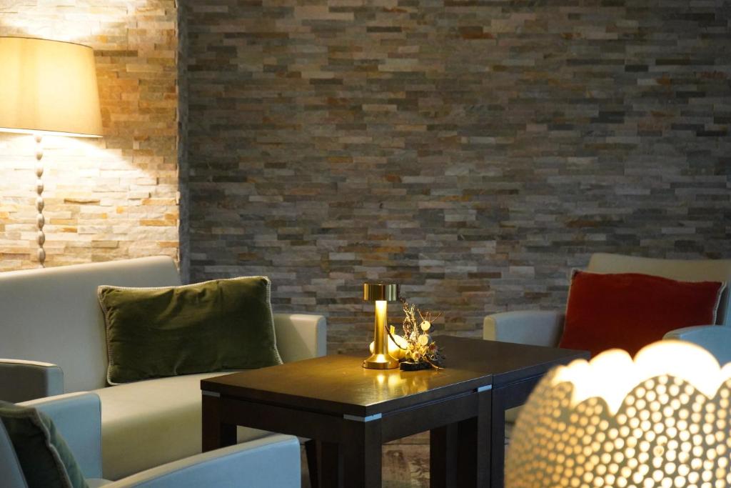 Posezení v ubytování Maison Jenny Hotel Restaurant & Spa