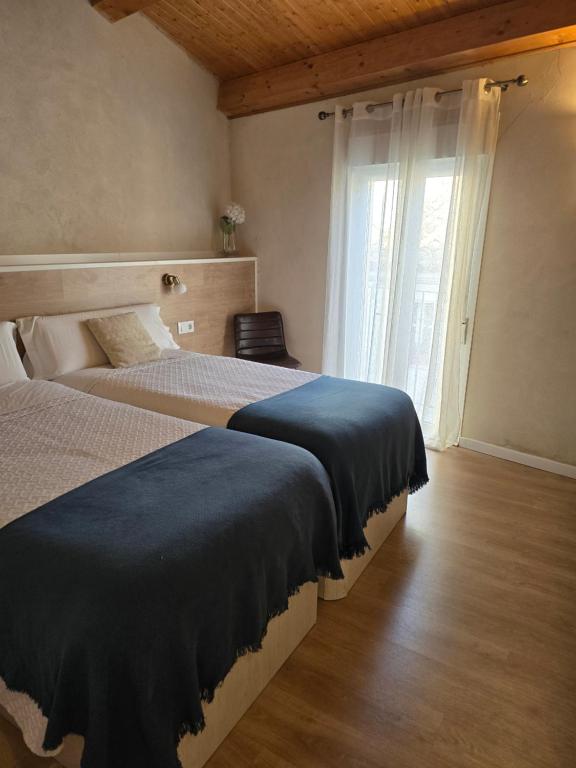 Postel nebo postele na pokoji v ubytování LA Isla de Mirabel