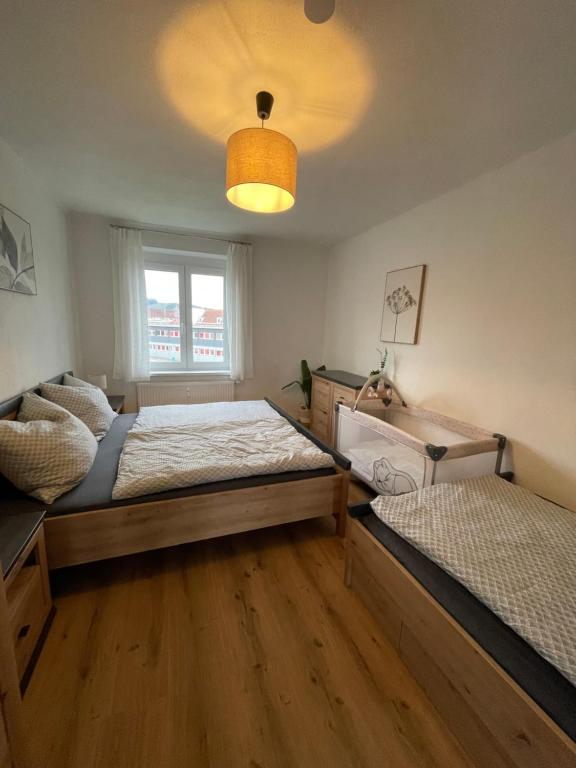Postel nebo postele na pokoji v ubytování Tom s Apartment