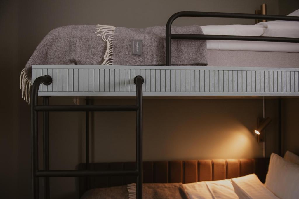 Postel nebo postele na pokoji v ubytování Home Hotel Christian IV