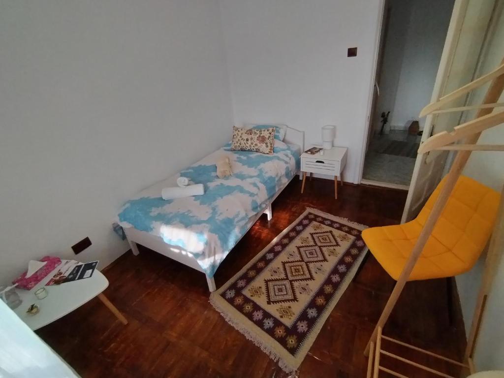 Postel nebo postele na pokoji v ubytování Chez Marcel la Briza Dunării