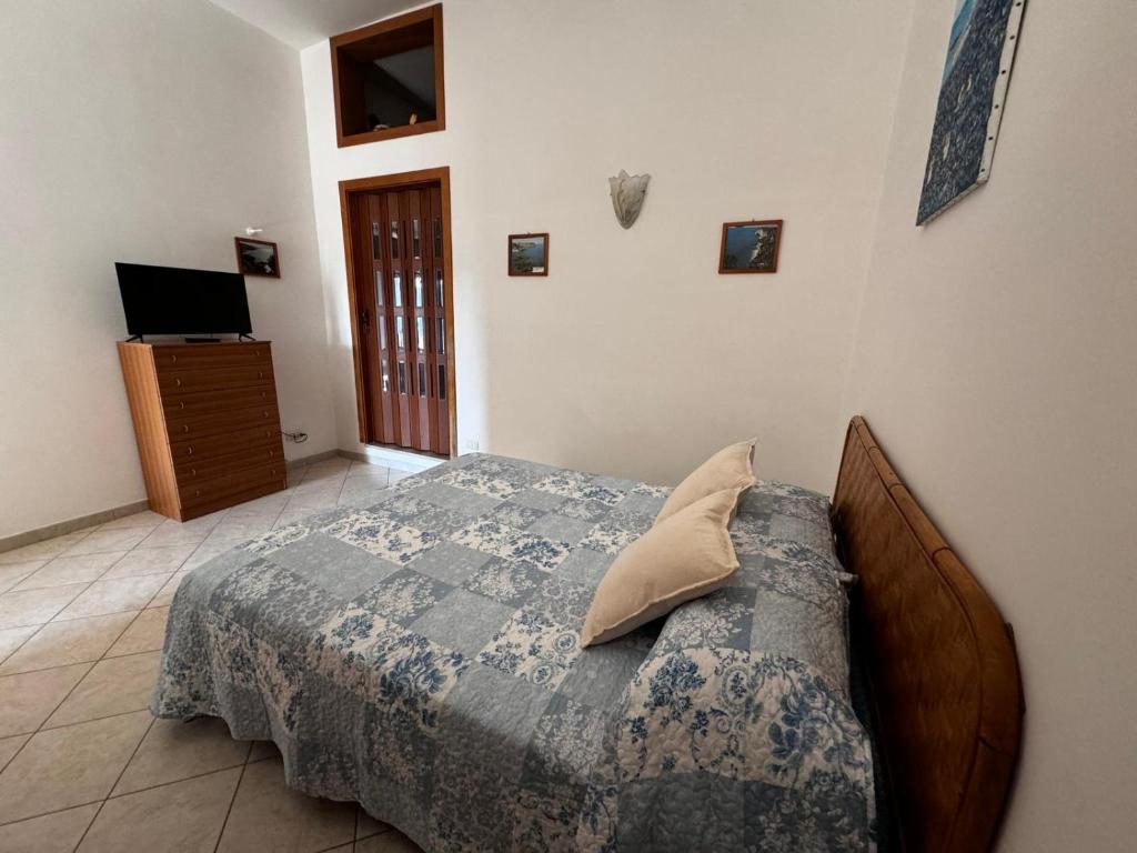 Postel nebo postele na pokoji v ubytování Conte Cavour B&B