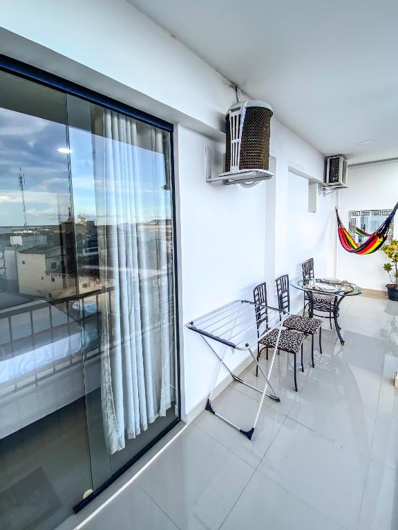 TV a/nebo společenská místnost v ubytování Acorde com Vista para o Rio no Centro de Manaus