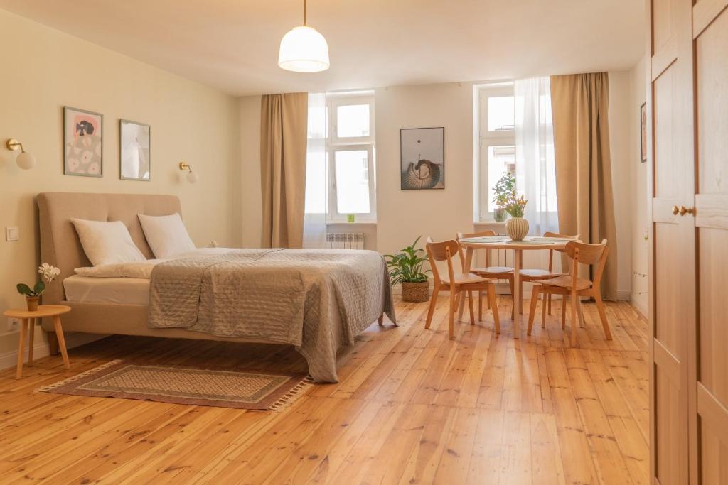 Postel nebo postele na pokoji v ubytování Cocorico Apartments
