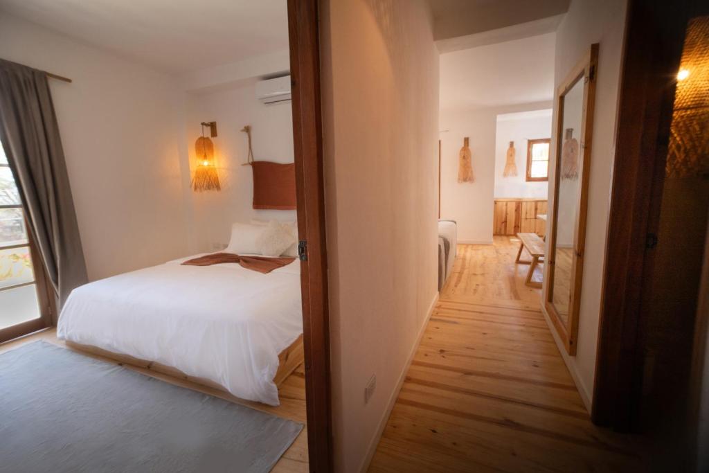 Postel nebo postele na pokoji v ubytování Hotel Kokua Boutique