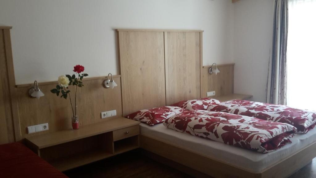 A bed or beds in a room at Haus Talblick