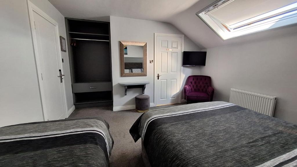 TV a/nebo společenská místnost v ubytování Murphy's Guesthouse
