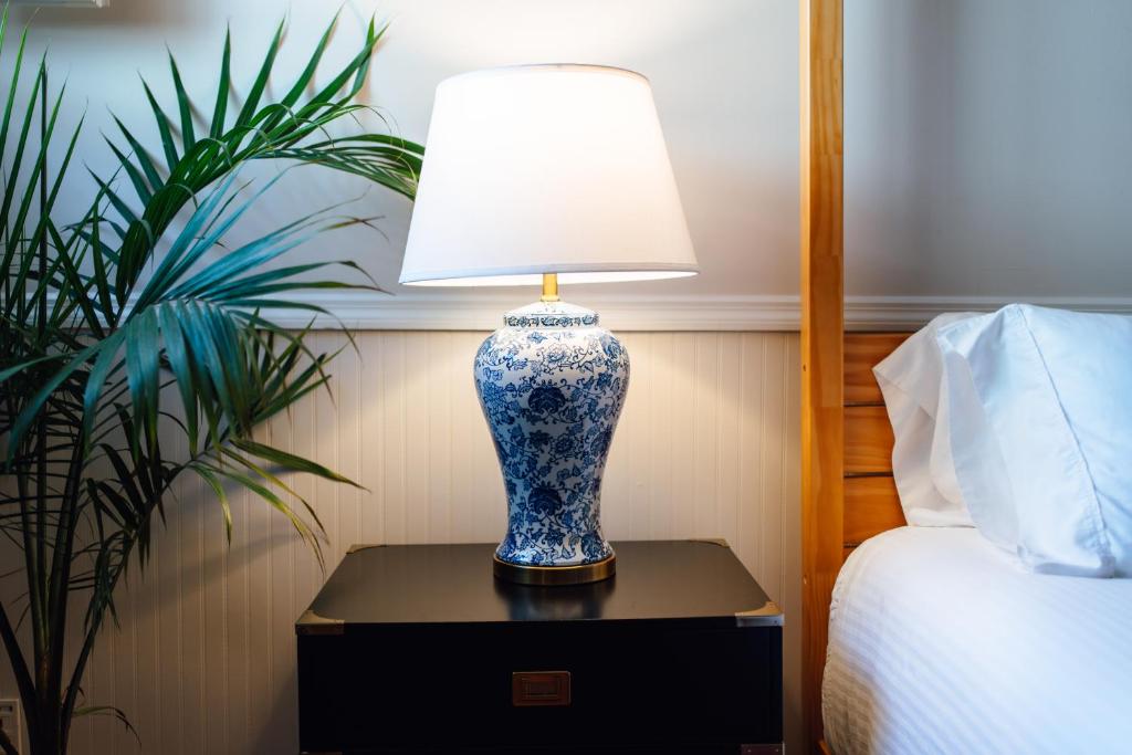 Postel nebo postele na pokoji v ubytování Swank Boutique Suites
