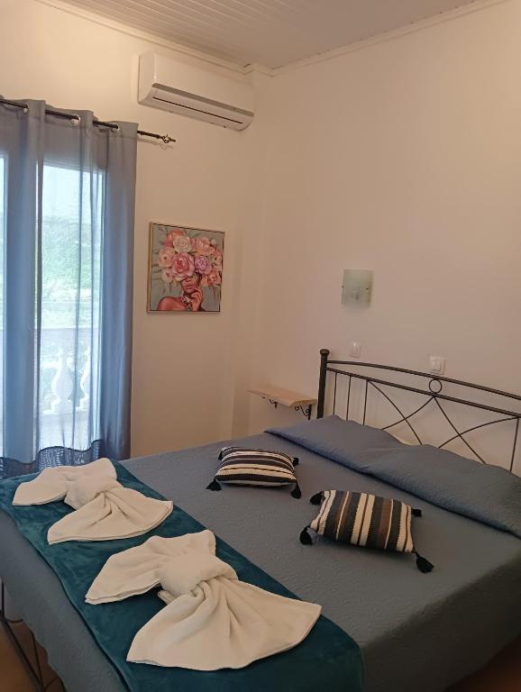 Postel nebo postele na pokoji v ubytování Casa Maria Sidari