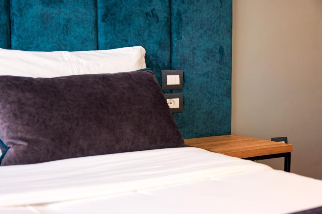 Krevet ili kreveti u jedinici u okviru objekta Hotel Apollon Sarande