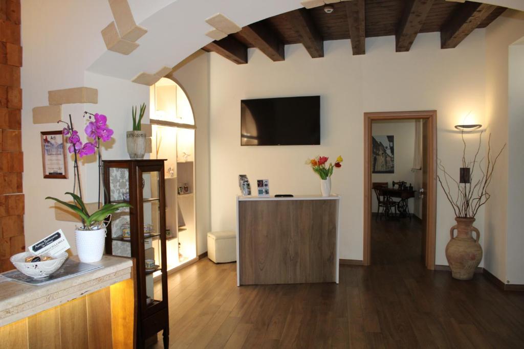 TV a/nebo společenská místnost v ubytování Il Borgo Ospitale - Albergo Diffuso