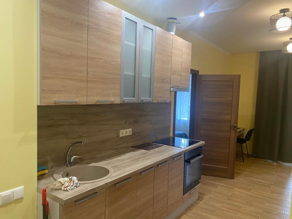 Kuchyň nebo kuchyňský kout v ubytování Appartament Karja 26A/10