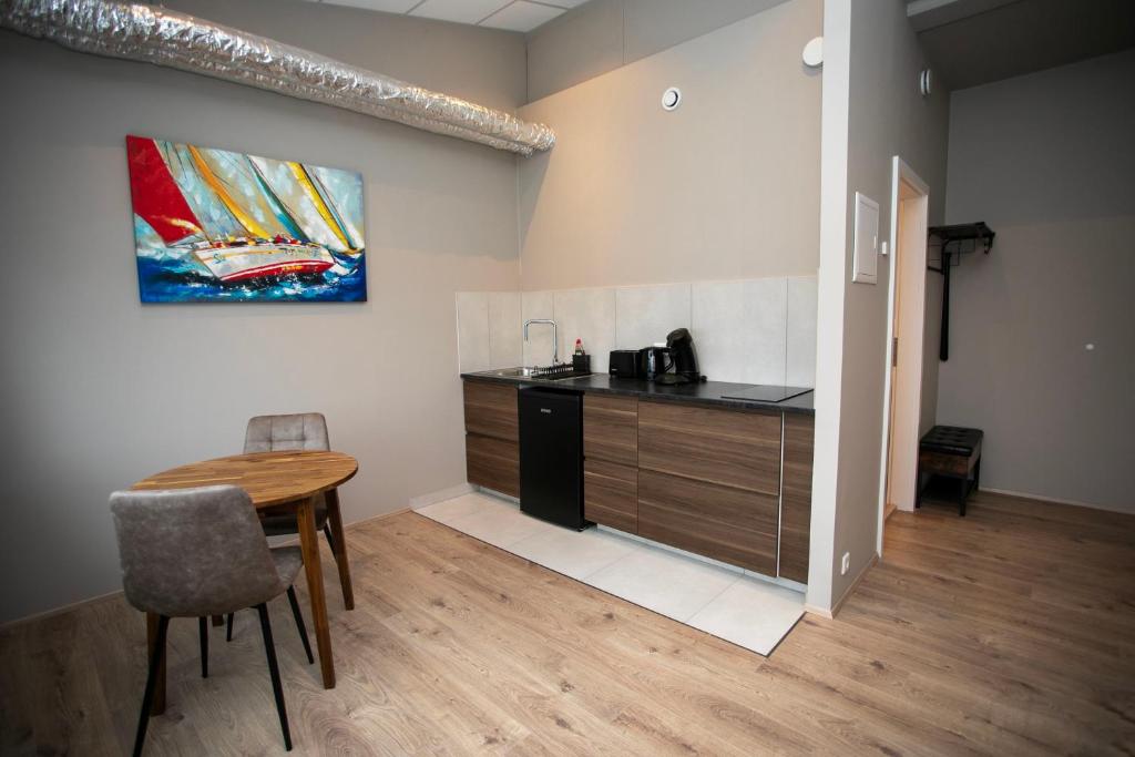 Kuchyň nebo kuchyňský kout v ubytování Skýjaborg Apartments