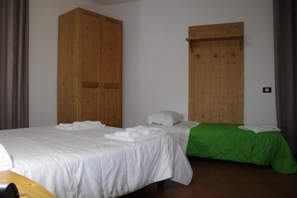 Postel nebo postele na pokoji v ubytování A' Porta i Frustere