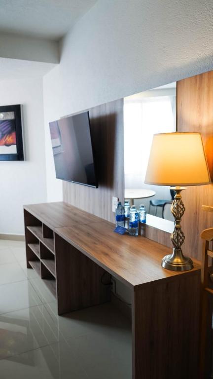 Kuchyň nebo kuchyňský kout v ubytování Hotel Laffayette Ejecutivo