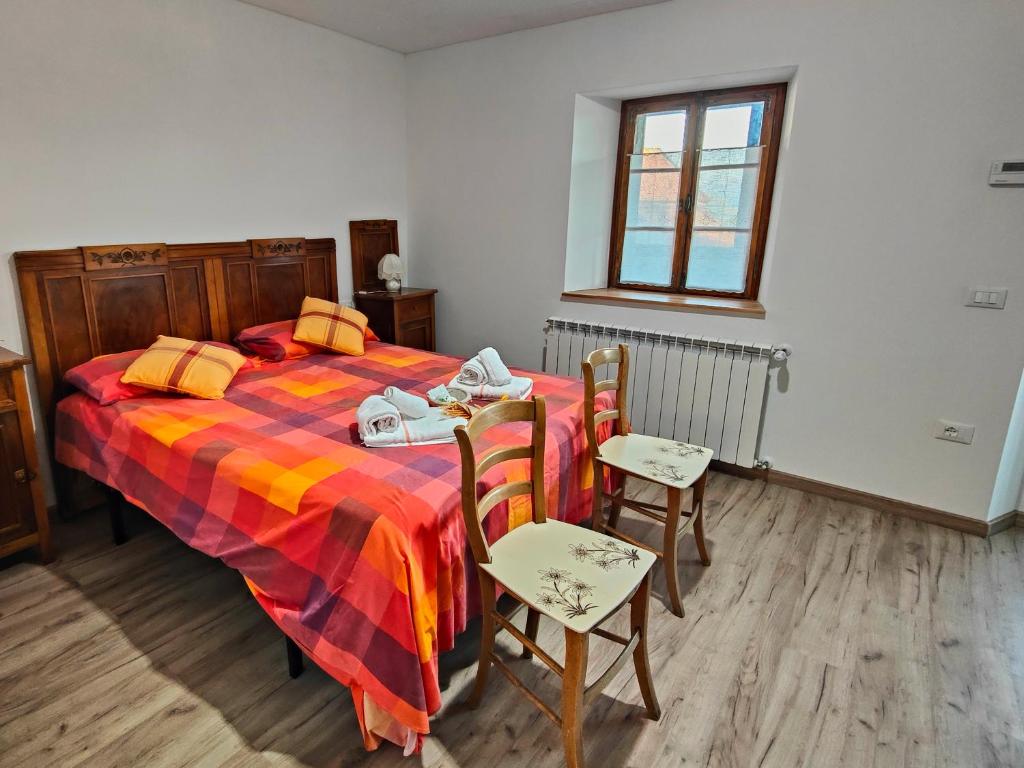 Postel nebo postele na pokoji v ubytování Cjase in val