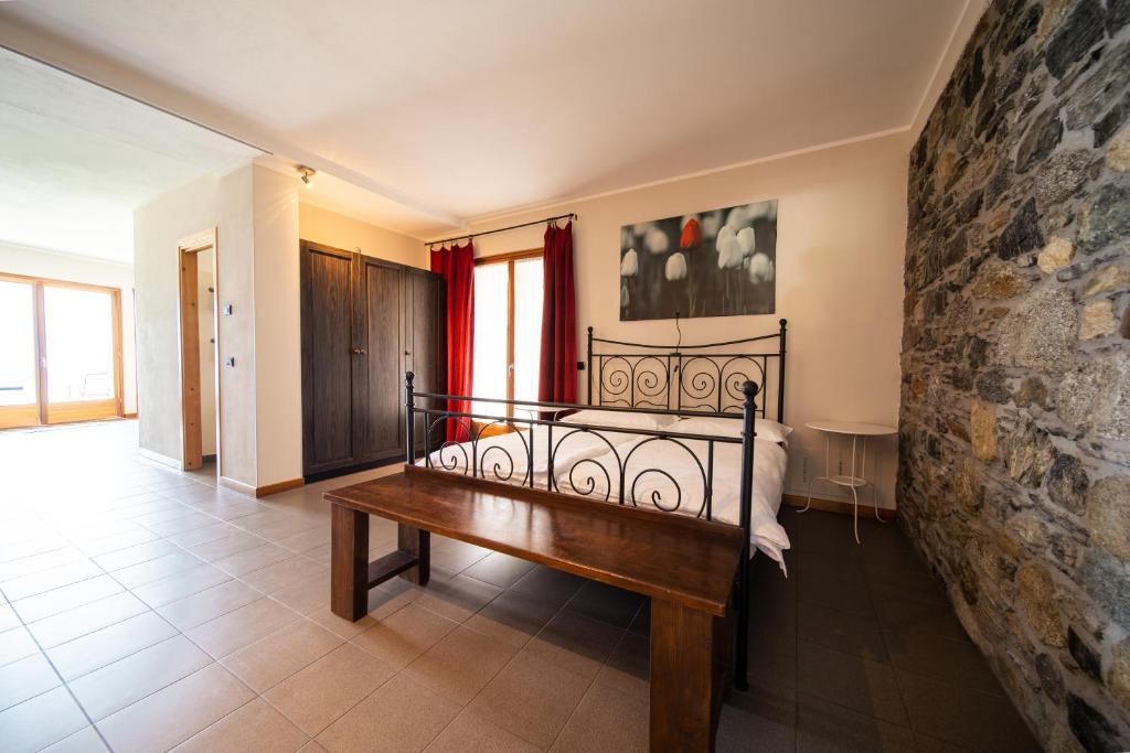 Postel nebo postele na pokoji v ubytování Bed and Breakfast Studios Alto lago di Como