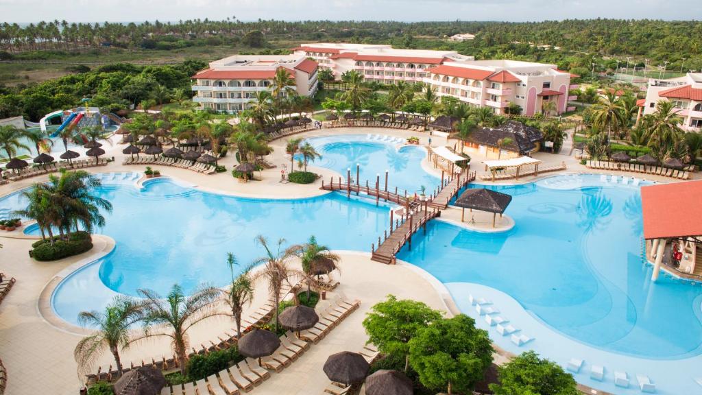 an overhead view of a pool at a resort at Grand Palladium Imbassaí Resort & Spa - All Inclusive in Imbassai