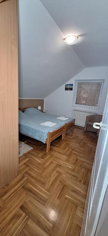 Postel nebo postele na pokoji v ubytování ANA Apartment