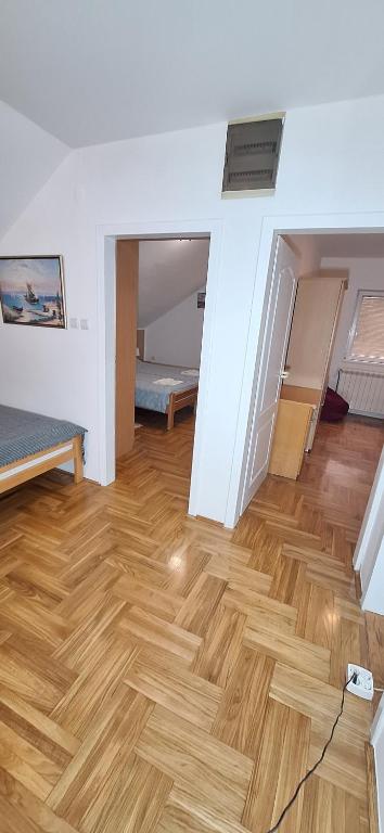 Postel nebo postele na pokoji v ubytování ANA Apartment