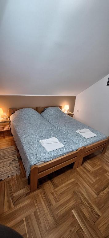 Postel nebo postele na pokoji v ubytování ANA Apartment