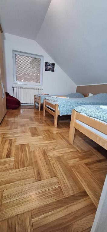 Postel nebo postele na pokoji v ubytování ANA Apartment