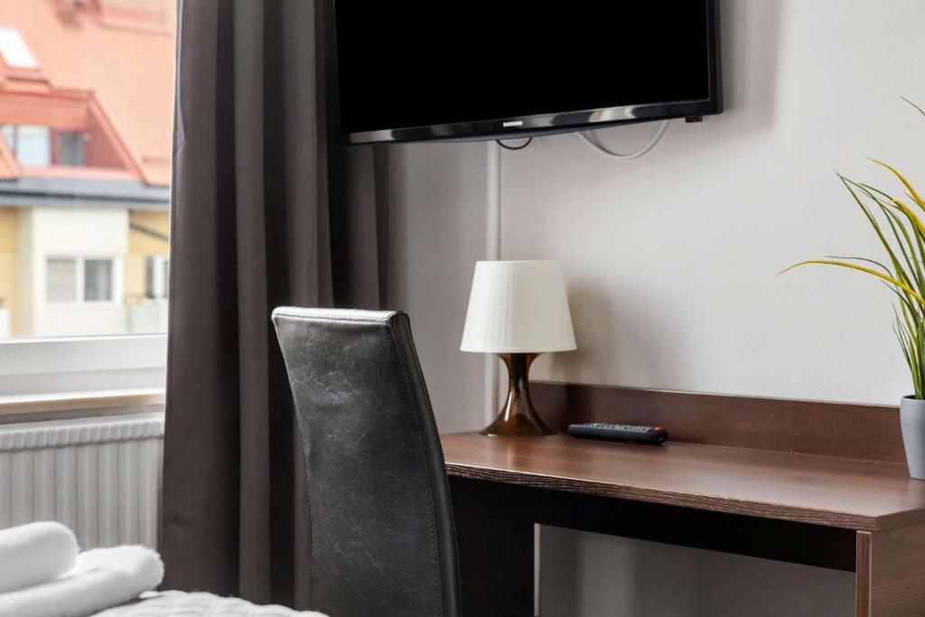 TV a/nebo společenská místnost v ubytování Best Western Hotel Solna