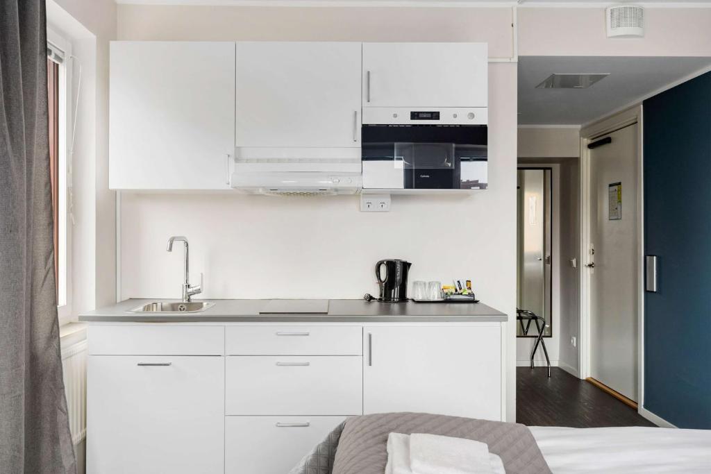 Kuchyň nebo kuchyňský kout v ubytování Best Western Hotel Solna