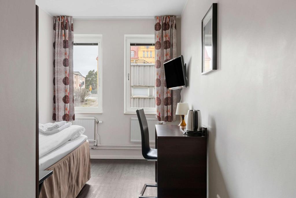 TV a/nebo společenská místnost v ubytování Best Western Hotel Solna