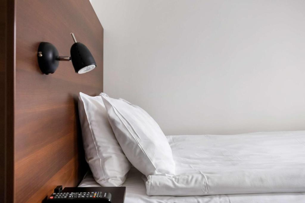 Postel nebo postele na pokoji v ubytování Best Western Hotel Solna