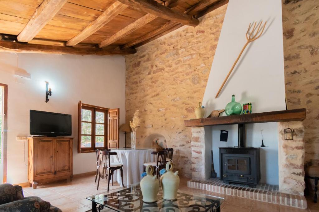 Televízia a/alebo spoločenská miestnosť v ubytovaní Finca&Spa Vereda Real