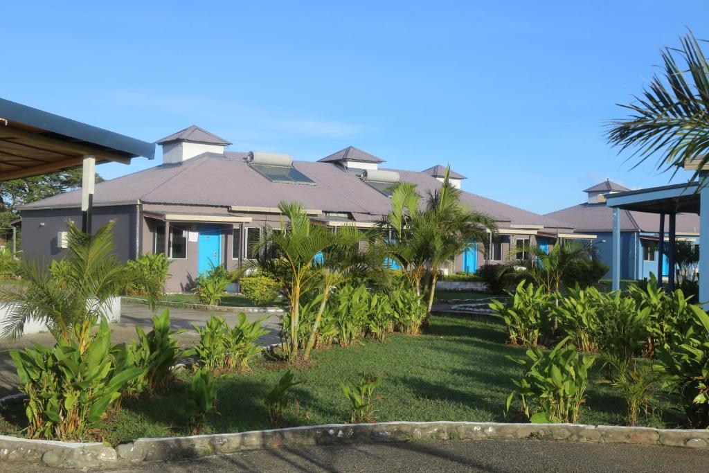 a row of houses in a resort at Funworld Plaza Hotel in Nadi