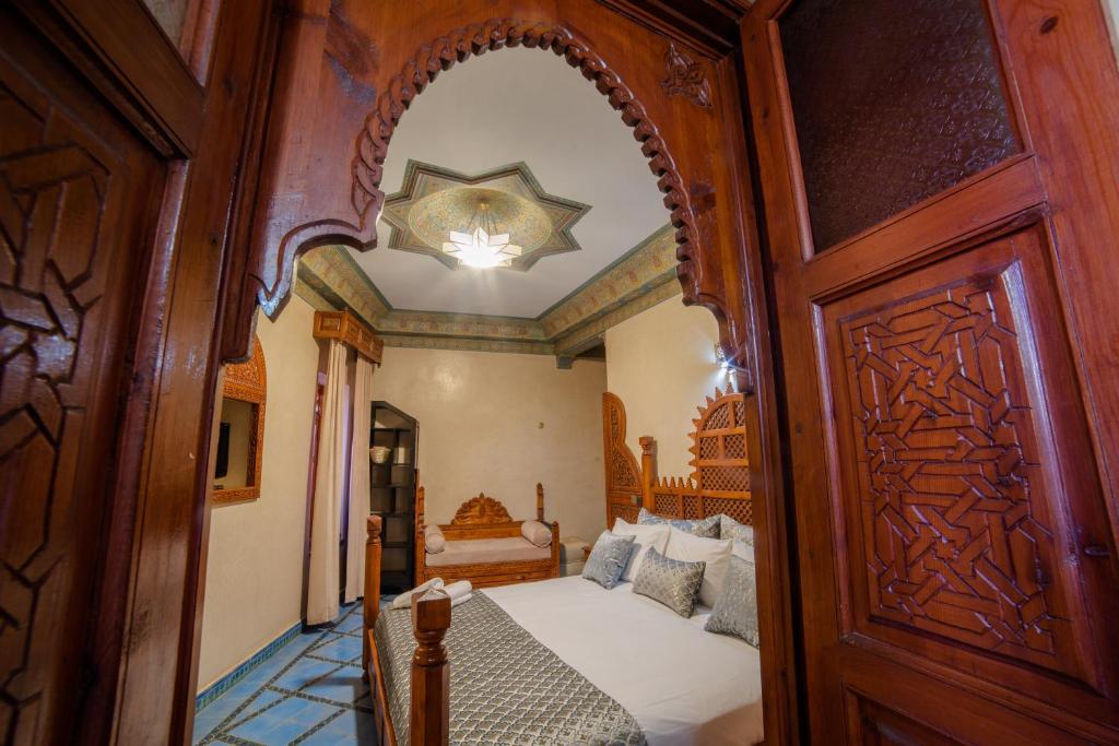 Postel nebo postele na pokoji v ubytování Riad El Wiam