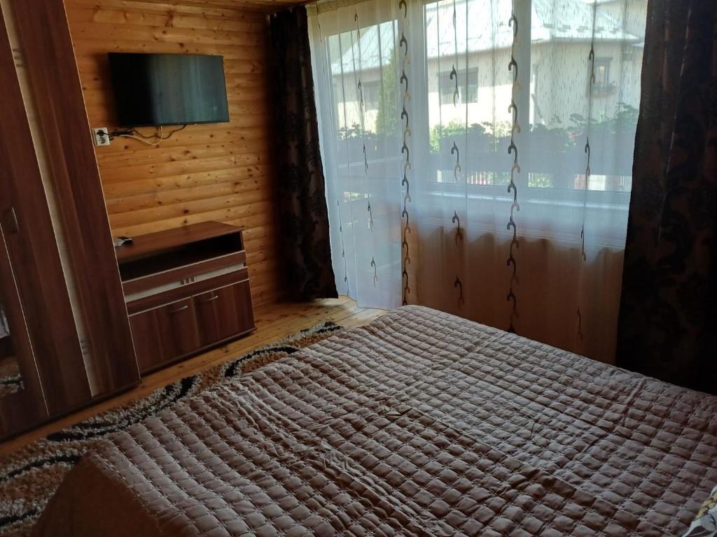 Postel nebo postele na pokoji v ubytování Casa Gherman