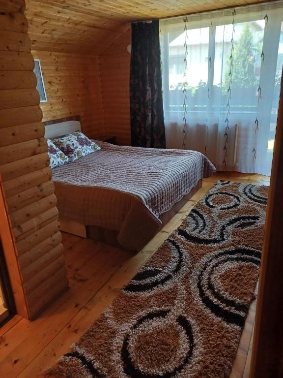 Postel nebo postele na pokoji v ubytování Casa Gherman