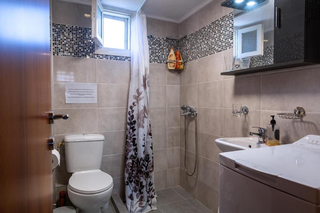 Kúpeľňa v ubytovaní Maisonette “The White Rabbit” Afitos