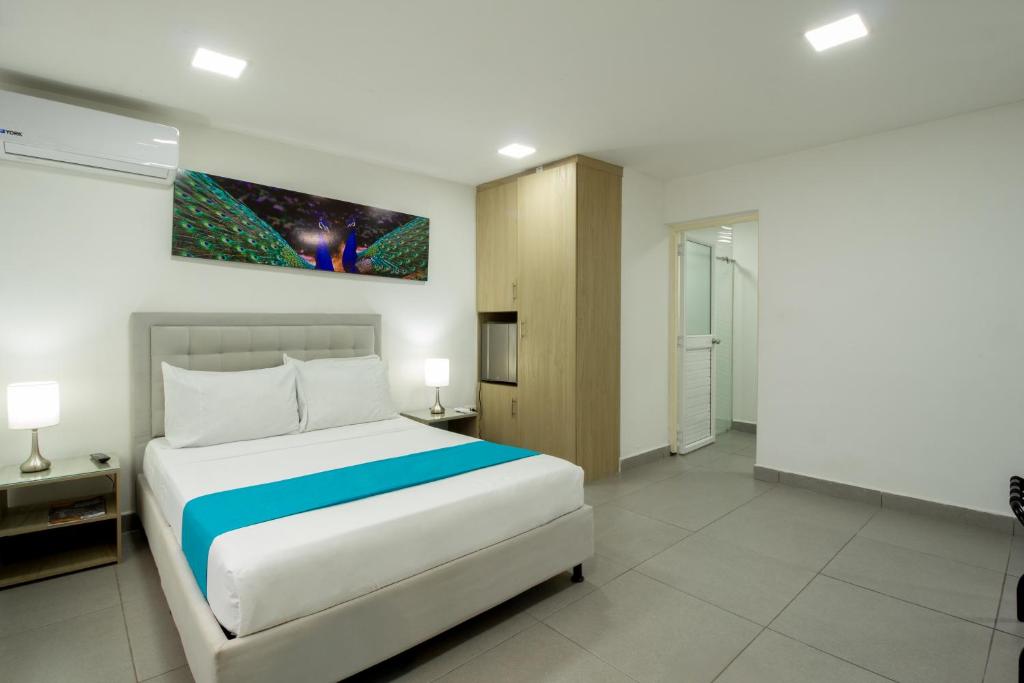 Cama o camas de una habitación en Hotel Villa Mónaco