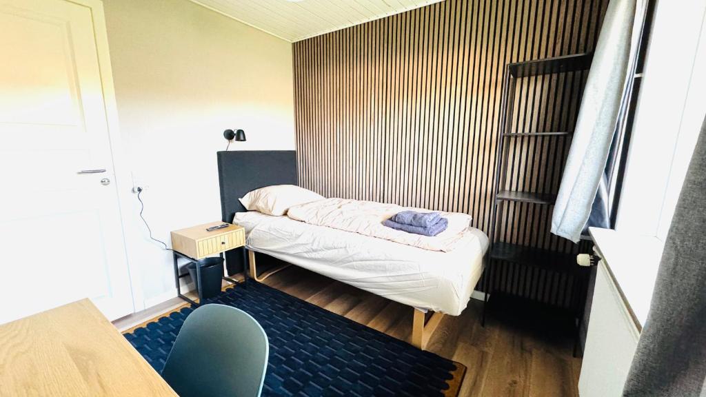 Ein Bett oder Betten in einem Zimmer der Unterkunft Guest Home Oksbøl