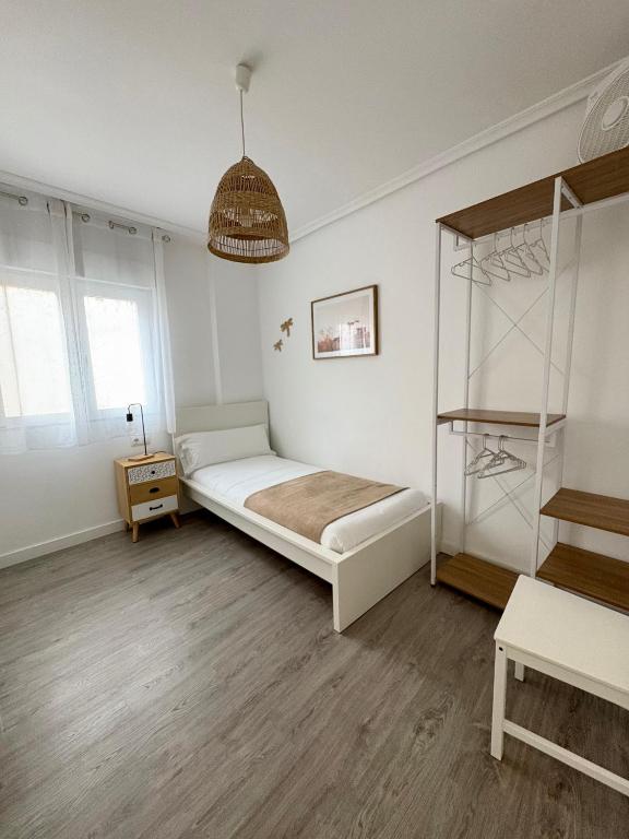 Postel nebo postele na pokoji v ubytování En el corazón de Santander