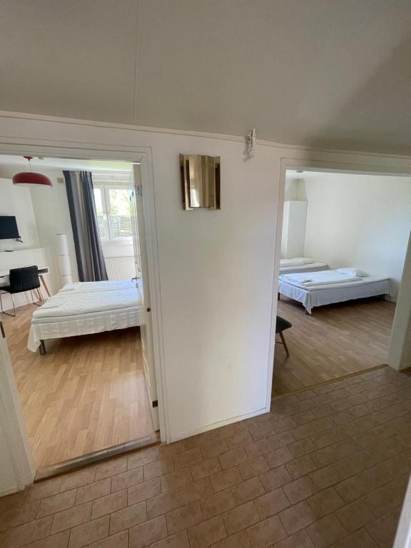 Postel nebo postele na pokoji v ubytování Fleninge Classic Motel