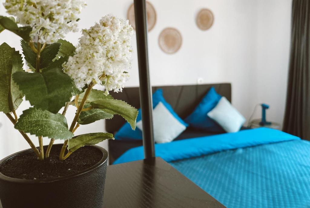Ένα ή περισσότερα κρεβάτια σε δωμάτιο στο EL Haus