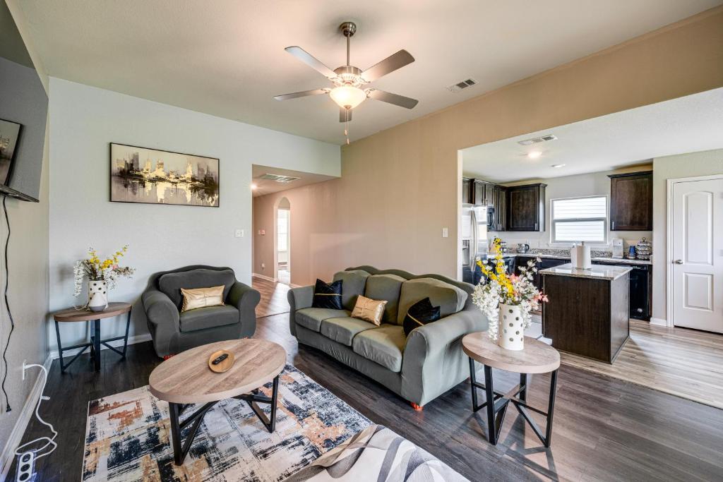 a living room with a couch and a table at Patio and Fenced Yard Peaceful Venus Retreat in Midlothian