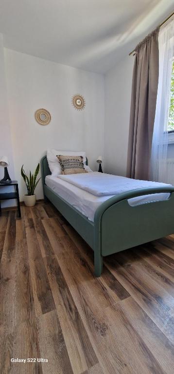 Posteľ alebo postele v izbe v ubytovaní Apartamenty Mikołajki na Kajki