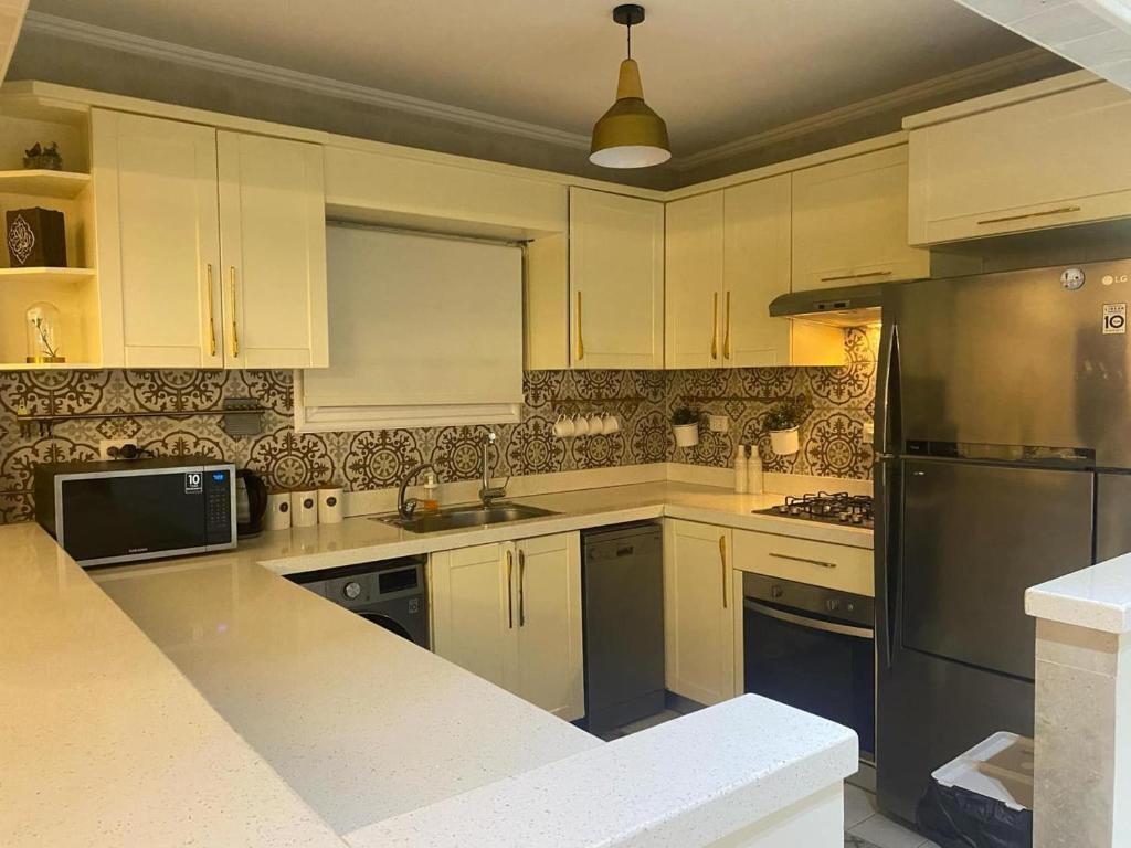 Kuchyň nebo kuchyňský kout v ubytování Life city home