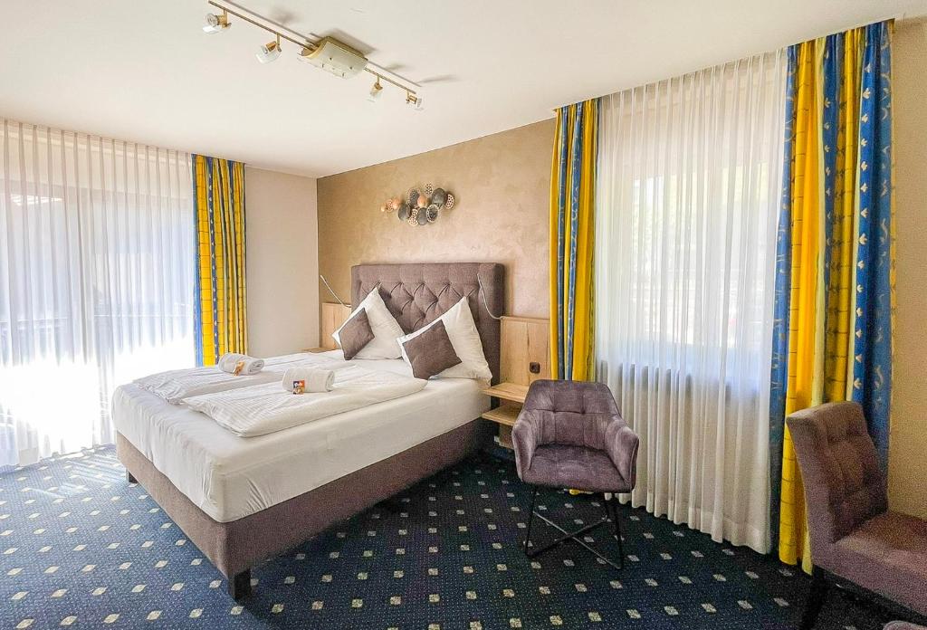 Postel nebo postele na pokoji v ubytování Gästehaus Forellenhof