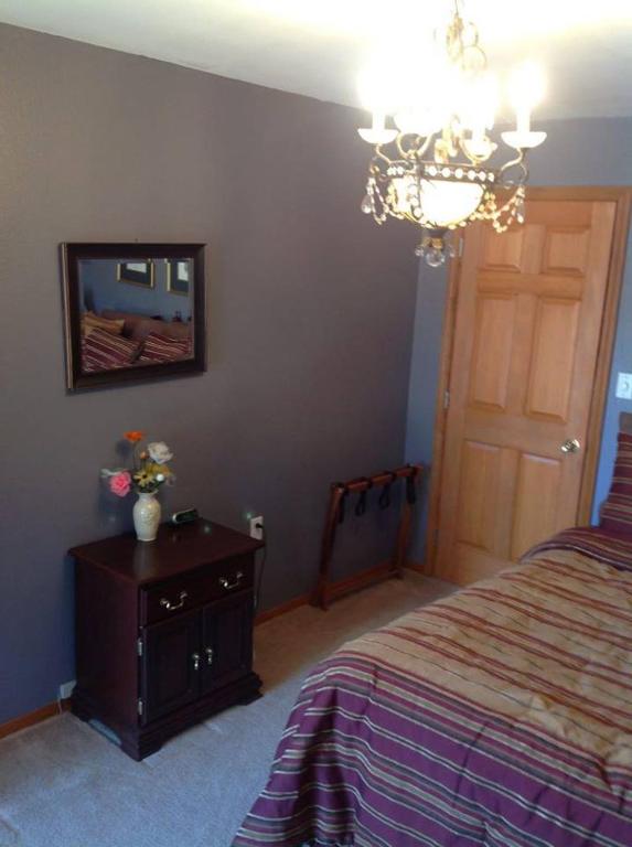 Postel nebo postele na pokoji v ubytování A Hyde Away Inn B&B