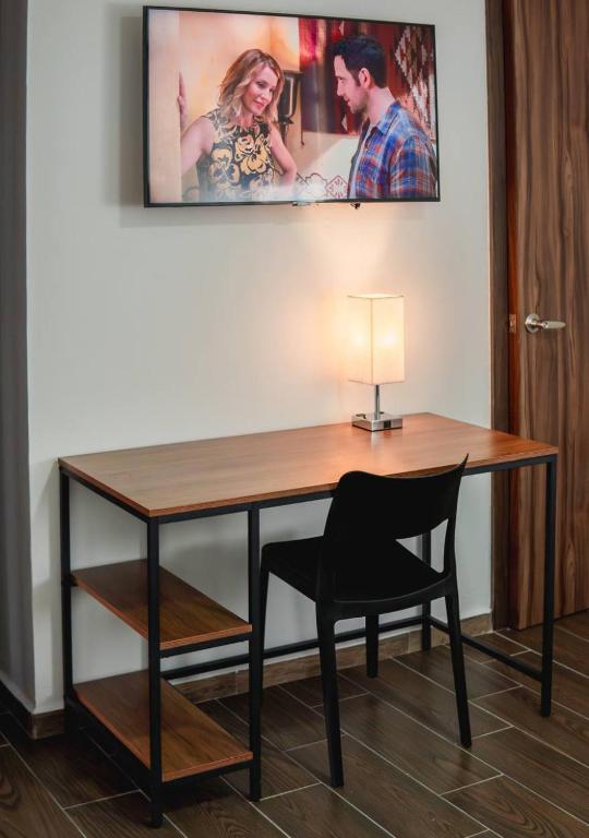 TV a/nebo společenská místnost v ubytování Hotel Atilana