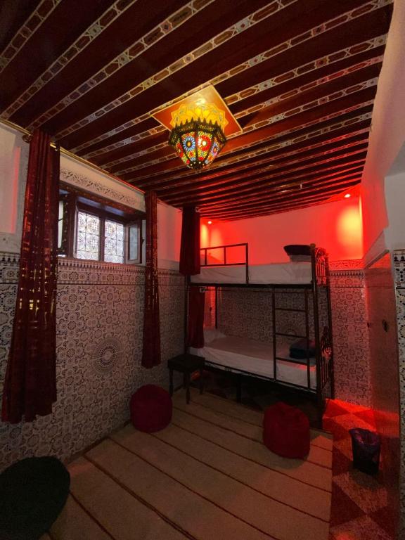 Postel nebo postele na pokoji v ubytování la Kasbah salam