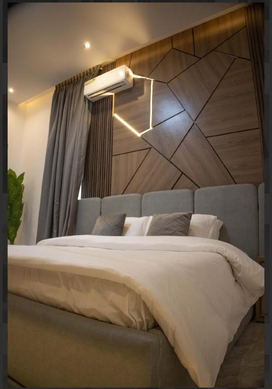Postel nebo postele na pokoji v ubytování Tinapra properties