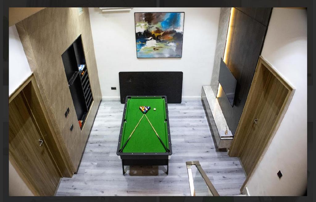 TV a/nebo společenská místnost v ubytování Tinapra properties
